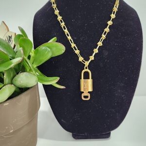 Authentic Louis Vuitton lock on unbranded necklace chain